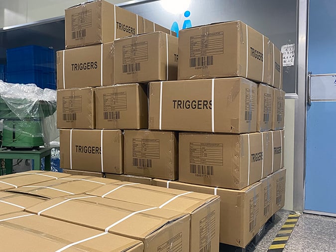 Packaging for trigger sprayers before delivery